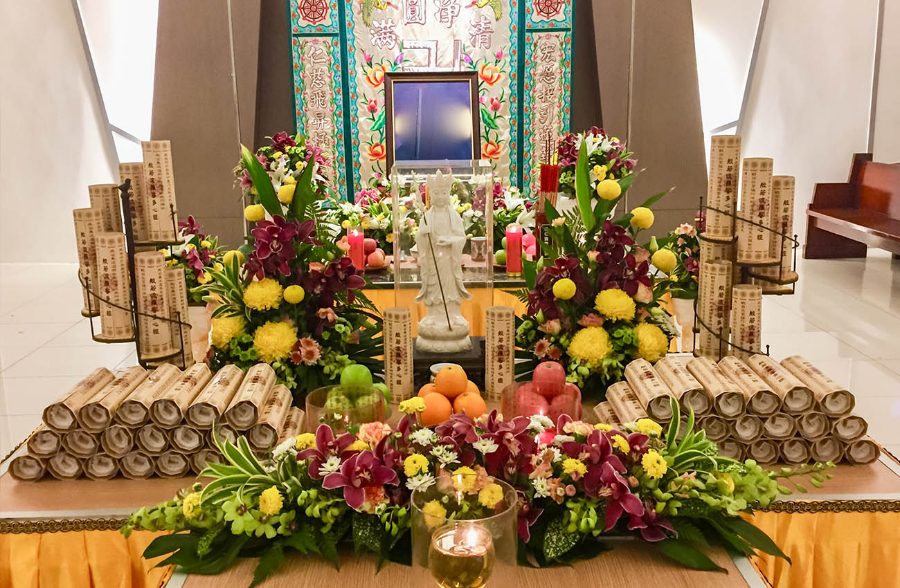 Buddhist memorial altar with scripture scrolls